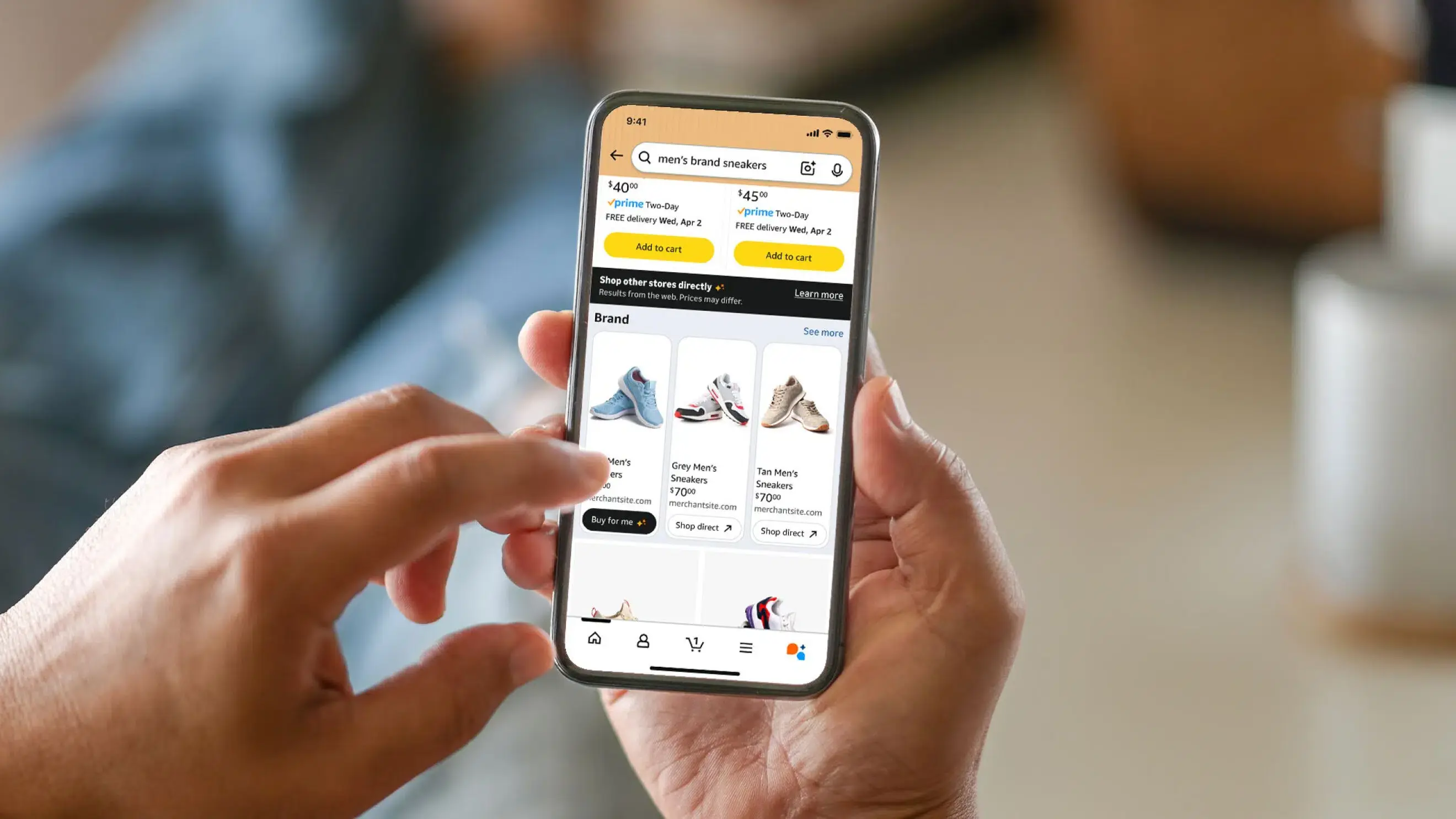 A close up of a consumer browsing products on the Amazon mobile shopping app, demonstrating digital personalisation and AI powered search recommendations